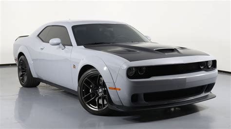 Used 2022 Dodge Challenger SRT Super Stock RWD 2dr Car Pitch Black Clearcoat for sale - only 135,000. . Challenger super stock widebody for sale